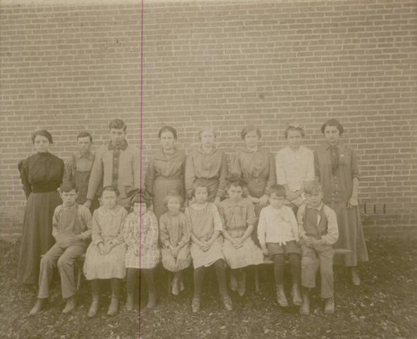 photo of Maggie Lamb with students